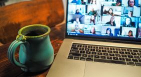 macbook pro displaying group of people